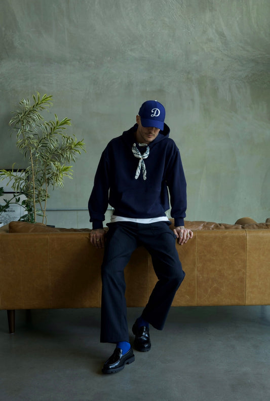 Blue Nuit Monceau Men's Blue Hoodie Sweatshirt with Bandanoush and Ring by Belle Epoque Los Angeles, front view on model